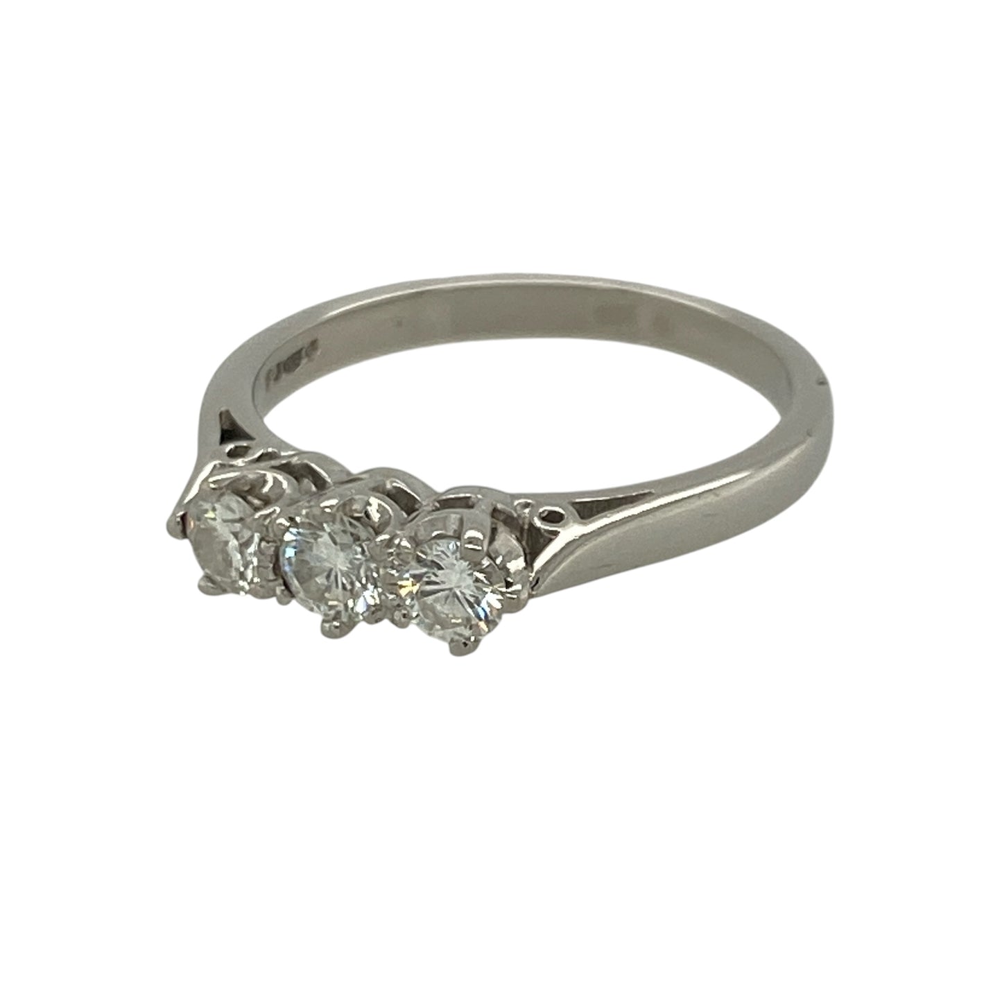 Celebrate life's special moments with this elegant pre-owned platinum diamond trilogy ring. Featuring three sparkling diamonds, the classic trilogy design beautifully represents the past, present and future, making it a meaningful choice for an engagement, anniversary or special gift.

Design: The ring features a timeless trilogy setting with three diamonds arranged across the front, creating a balanced design with exceptional brilliance.