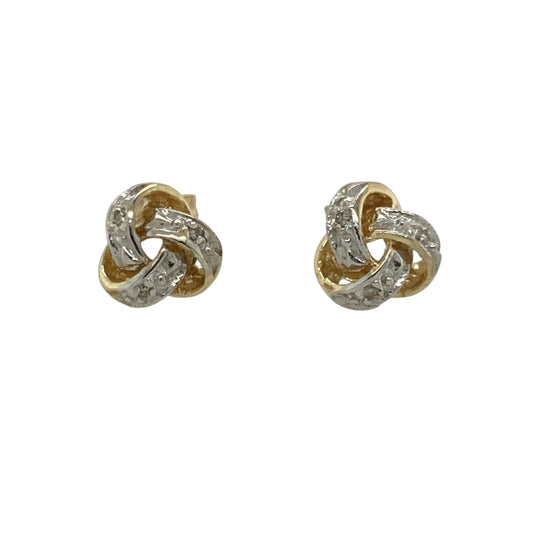 Classic and elegant, these pre-owned 9ct yellow and white gold diamond knot stud earrings are a timeless addition to any jewellery collection. The intertwined knot design symbolises unity and everlasting love, while the diamond detailing adds a subtle touch of sparkle.

Design: The earrings feature a traditional knot design, combining yellow and white gold for a stylish two-tone finish with sparkling diamond accents.