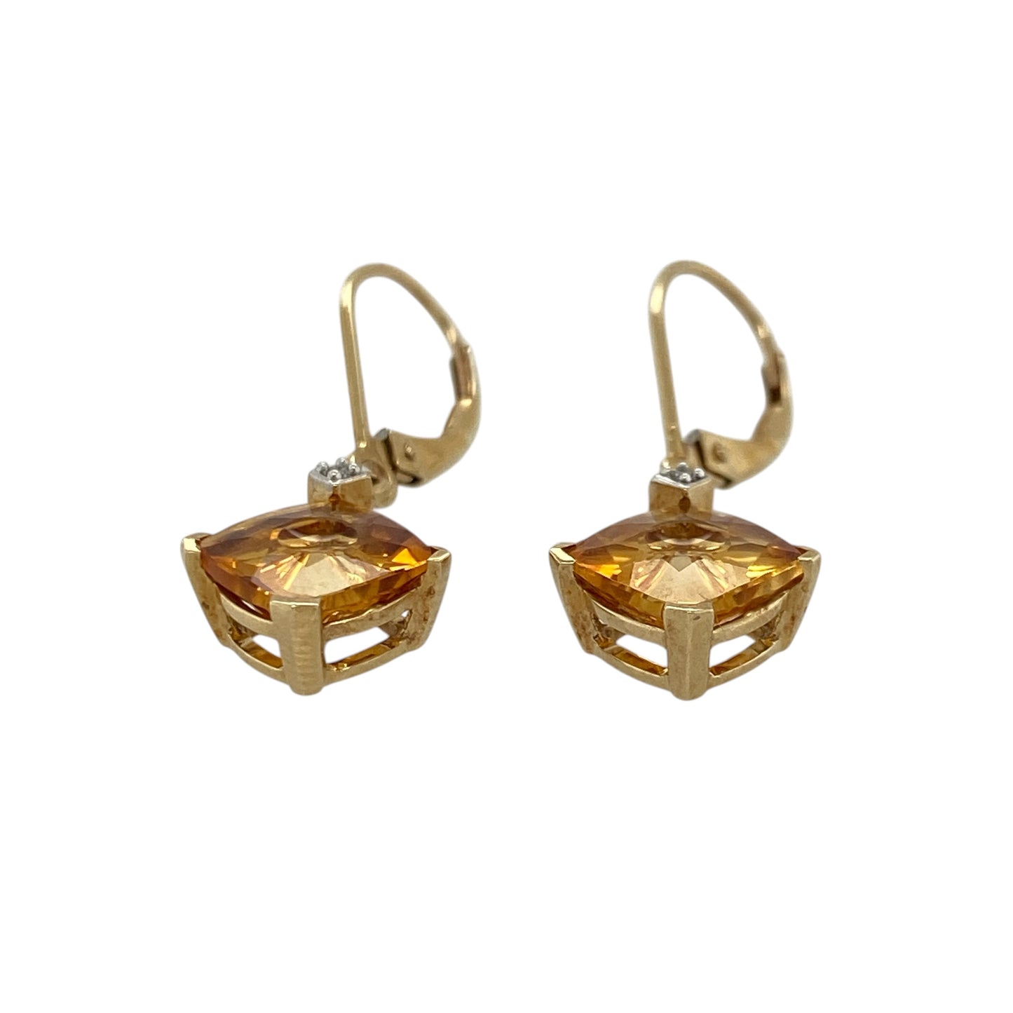 Bright and elegant, these pre-owned 9ct yellow gold diamond and citrine drop earrings are a beautiful way to add warm golden tones to any jewellery collection. Featuring sparkling diamonds above vibrant square citrine gemstones, they offer timeless style for both everyday wear and special occasions. Citrine is the birthstone for November, making these earrings a thoughtful gift for a November birthday.