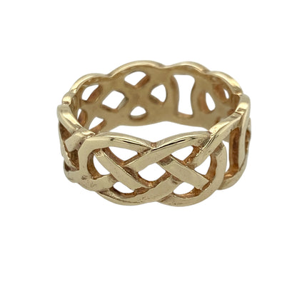 Bring timeless Celtic style to your jewellery collection with this pre-owned 9ct yellow gold open Celtic knot band ring, featuring an intricate openwork design that is perfect for everyday wear or as a meaningful gift.

Design: The ring features a striking open Celtic knot pattern that wraps around the full 7mm wide band, creating a bold yet elegant look inspired by traditional Celtic jewellery and timeless symbolism.