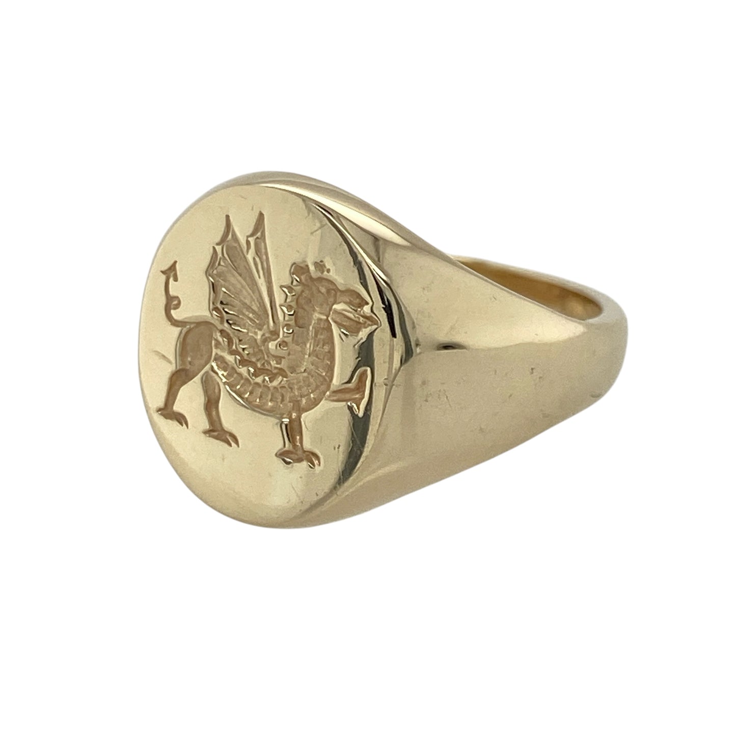 Show your Welsh pride with this pre-owned 9ct yellow gold Welsh Dragon oval signet ring, featuring the iconic dragon emblem in a bold and timeless design.

Design: The traditional oval signet face showcases a detailed Welsh Dragon, making this ring a striking symbol of Welsh heritage. Measuring approximately 14mm high, the bold face gives the ring a classic and distinguished appearance.