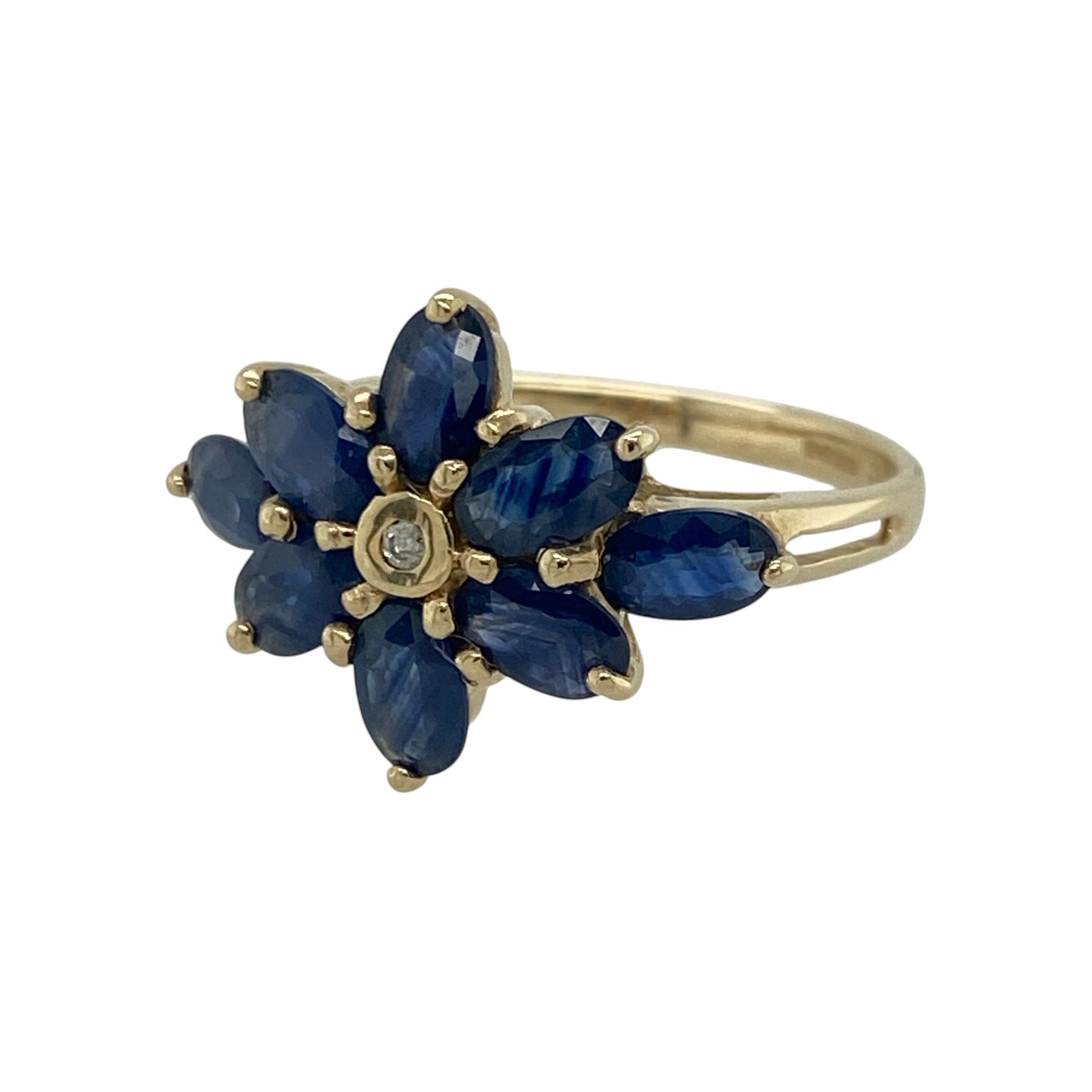 Bring a touch of floral elegance to your jewellery collection with this pre-owned 9ct yellow gold diamond and sapphire flower style ring, featuring a beautiful arrangement of marquise cut sapphires surrounding a sparkling diamond.

Design: The eye-catching flower-inspired design measures approximately 14mm high and is formed from marquise cut sapphires radiating around a central diamond, creating a timeless and elegant statement piece.