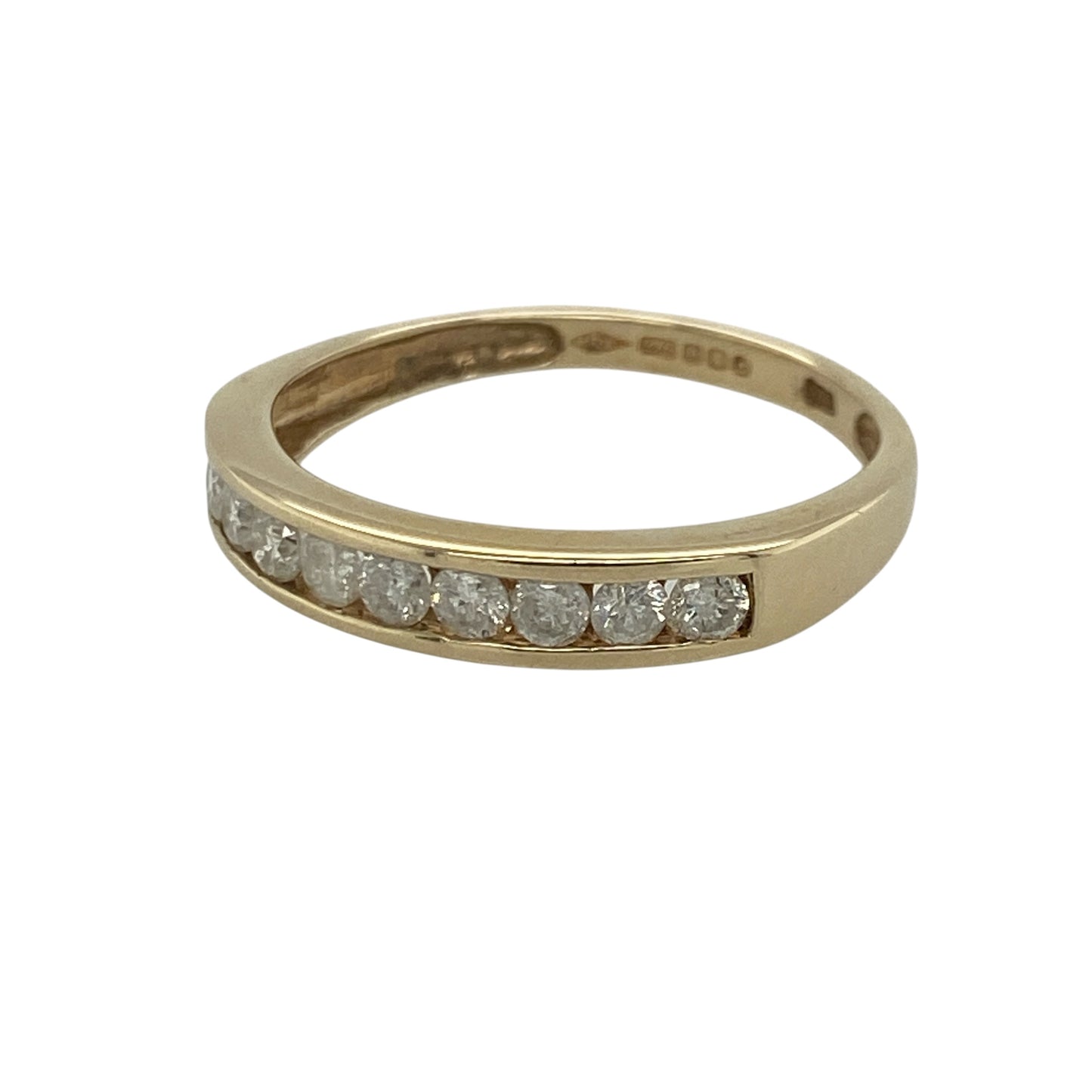 Add timeless sparkle to your jewellery collection with this pre-owned 9ct yellow gold diamond band ring, beautifully set with ten brilliant cut diamonds in a classic design.

Design: The elegant band measures approximately 3mm wide at the front and features ten brilliant cut diamonds set across the face, creating a refined look with plenty of sparkle. Its timeless style makes it perfect for everyday wear, stacking with other rings or celebrating a special occasion.
