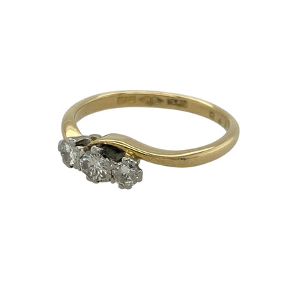Celebrate timeless elegance with this pre-owned 18ct yellow gold diamond trilogy twist ring, beautifully combining three sparkling diamonds with an elegant twisting band design.

Design: This classic trilogy ring features a graceful twist setting that flows around three brilliant diamonds, creating a sophisticated and eye-catching look. Traditionally representing the past, present and future, the trilogy design makes this ring a meaningful choice for a gift or special occasion.