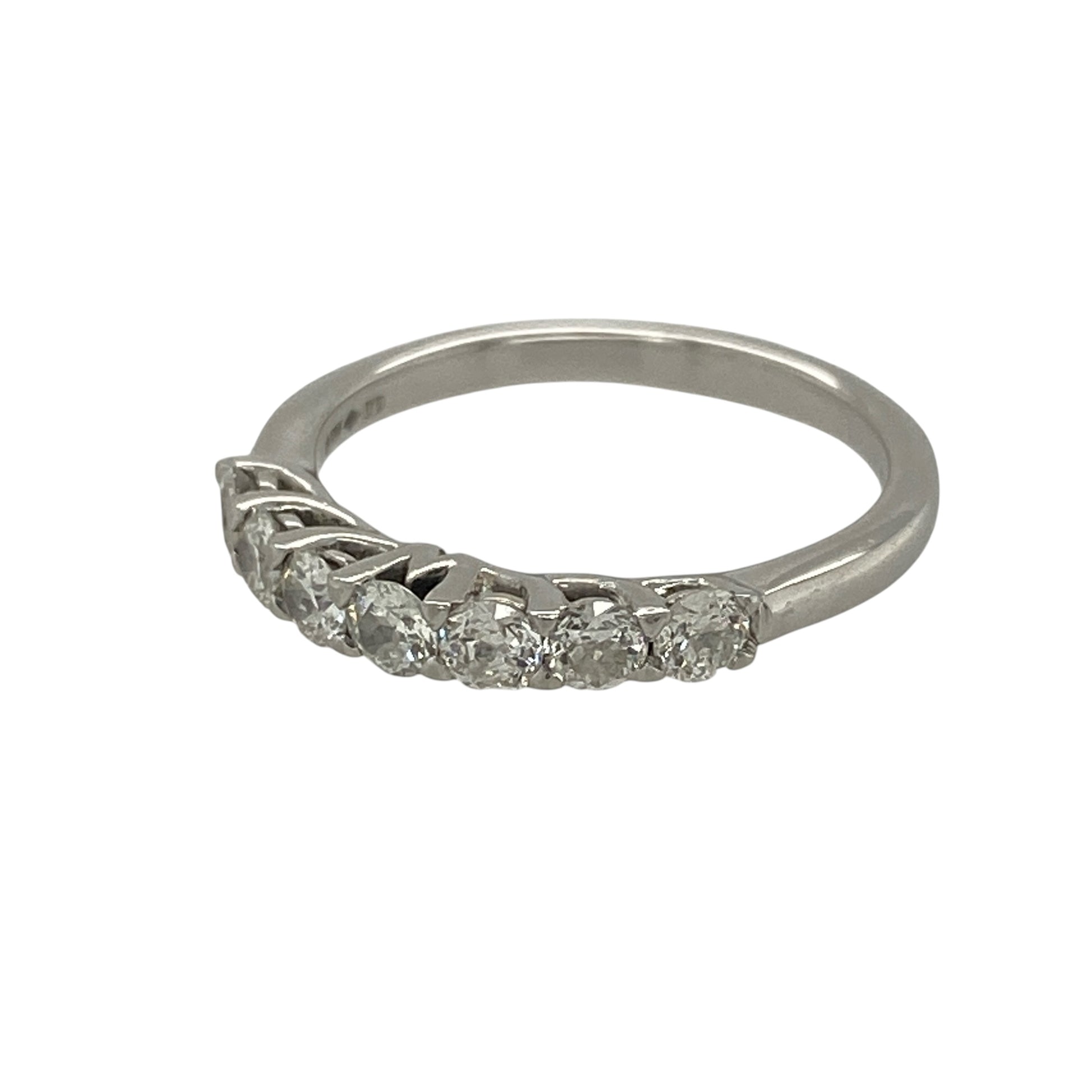 This pre-owned platinum diamond seven stone band ring is a timeless design, featuring seven sparkling diamonds that create an elegant and sophisticated look for everyday wear or special occasions.

Design: The classic seven stone setting showcases a row of beautifully matched diamonds, offering exceptional sparkle across the front of the band. Its timeless style makes it an ideal choice as an eternity ring, wedding band or a meaningful gift.