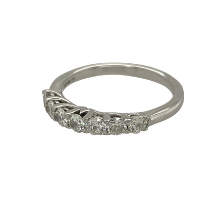 This pre-owned platinum diamond seven stone band ring is a timeless design, featuring seven sparkling diamonds that create an elegant and sophisticated look for everyday wear or special occasions.

Design: The classic seven stone setting showcases a row of beautifully matched diamonds, offering exceptional sparkle across the front of the band. Its timeless style makes it an ideal choice as an eternity ring, wedding band or a meaningful gift.