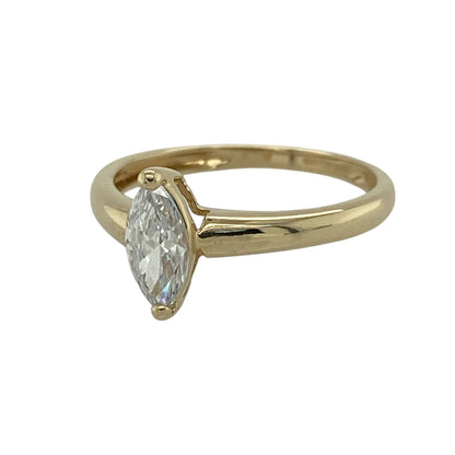 This pre-owned 14ct yellow gold solitaire ring features an elegant marquise-cut stone in a timeless setting, offering a classic look with a distinctive shape that is perfect for everyday wear or special occasions.

Design: The ring showcases a single marquise-cut stone in a traditional solitaire setting, allowing its elongated shape to take centre stage. The elegant design creates a refined look that pairs beautifully with other rings or can be worn on its own.