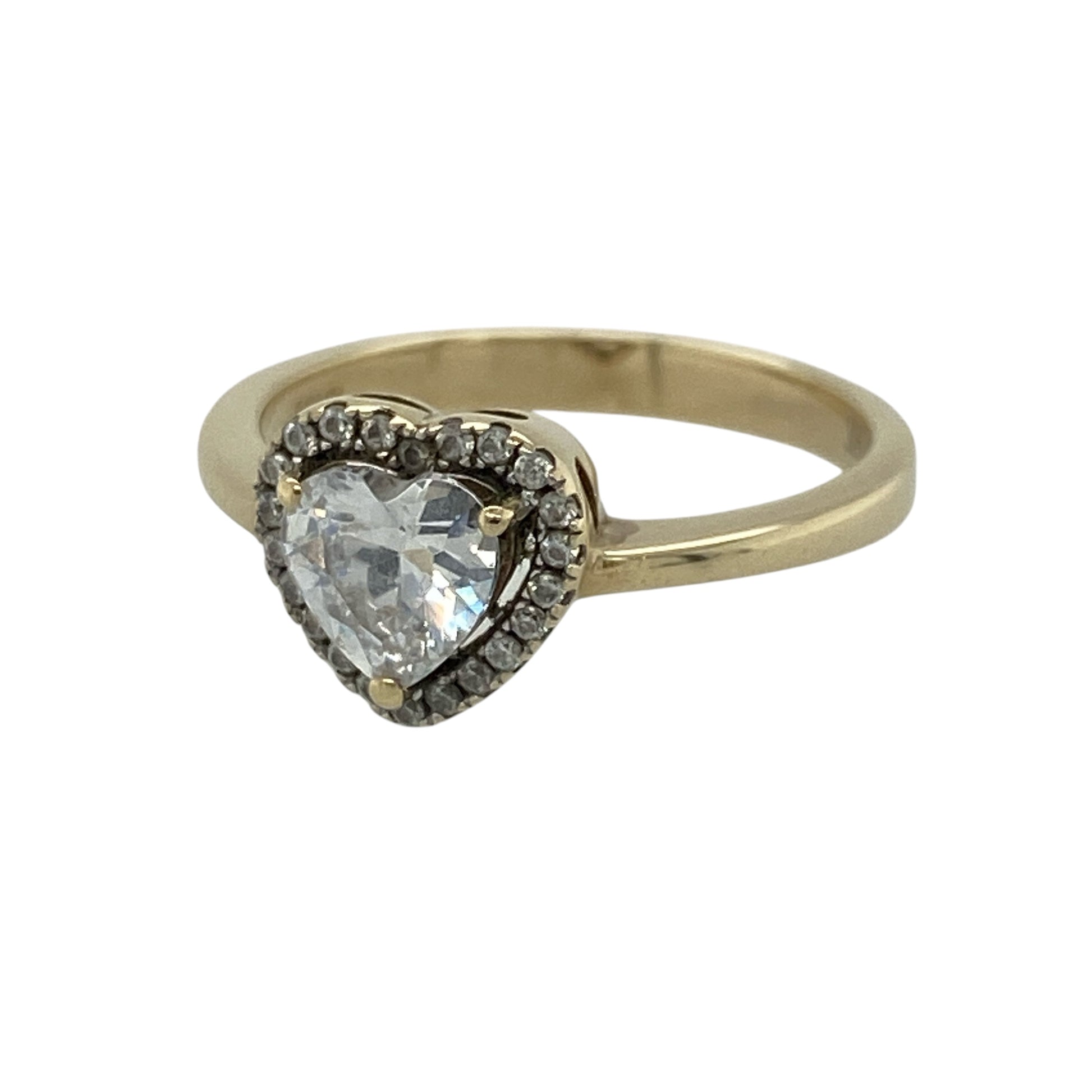 This pre-owned 9ct yellow gold cubic zirconia heart halo cluster ring is a beautiful symbol of love, featuring a sparkling heart-shaped centre stone surrounded by a halo of cubic zirconias for extra brilliance.

Design: The ring showcases a heart-shaped cubic zirconia centre stone framed by a halo of sparkling cubic zirconias, creating a timeless and eye-catching cluster design. The elegant setting gives the ring a bold yet feminine appearance.
