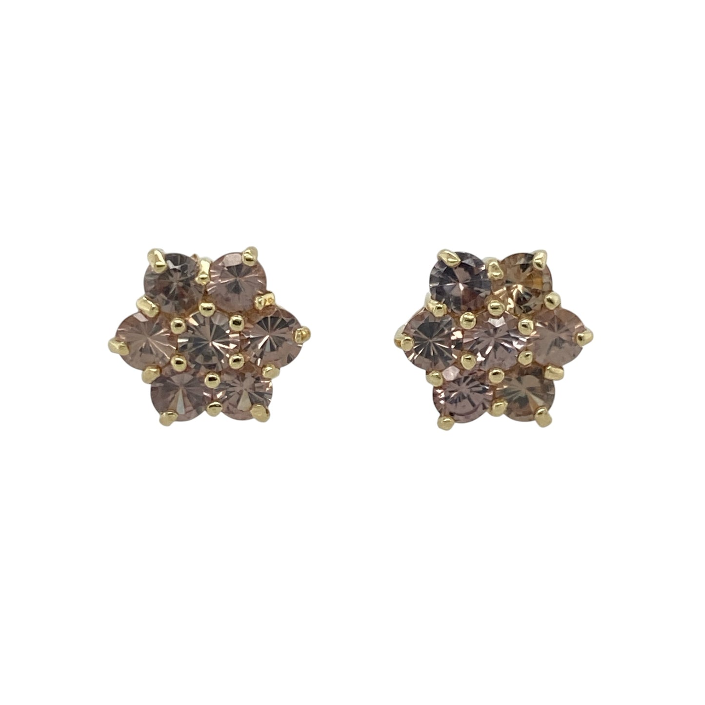 These pre-owned 9ct yellow gold flower cluster stud earrings feature beautiful grey-green stones arranged in a classic floral design, making them an elegant addition to any jewellery collection.

Design: Each stud is designed as a delicate flower cluster, set with grey-green stones that catch the light with subtle colour and sparkle. Their timeless style makes them suitable for both everyday wear and special occasions.
Material: Made from 9-carat yellow gold with grey-green stones.