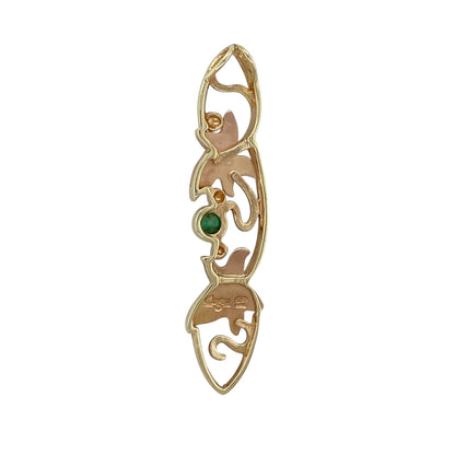 This pre-owned 9ct yellow and rose gold Clogau Lady of Caerphilly pendant is an elegant piece featuring the iconic Clogau design, beautifully enhanced with a cabochon emerald.

Design: The pendant showcases the Lady of Caerphilly design in a combination of 9-carat yellow and rose gold, accented by a round cabochon emerald. Its elongated silhouette and intricate detailing make it a striking statement piece inspired by Welsh heritage.
Material: Made from 9-carat yellow and rose gold.