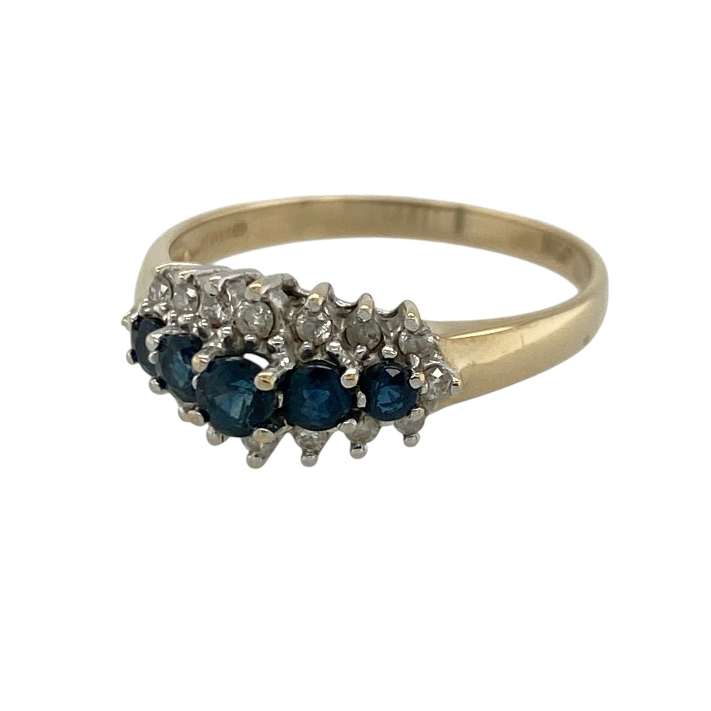 This pre-owned 9ct yellow gold diamond and five stone sapphire cluster band ring is a classic design, featuring graduating sapphires surrounded by sparkling diamonds.

Design: The ring showcases five round sapphires arranged across the front of the band in graduating sizes, with each sapphire framed by sparkling diamonds to create an elegant cluster effect. The timeless combination of deep blue sapphires and brilliant diamonds makes this ring ideal for both everyday wear and special occasions.