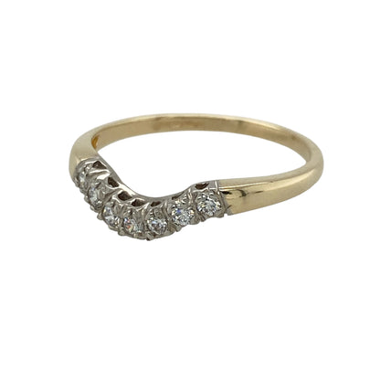 This pre-owned 9ct yellow gold diamond curved wishbone ring is an elegant and timeless design, perfect for wearing alone or stacked with other rings.

Design: The ring features a graceful curved wishbone shape, highlighted with sparkling diamonds across the front. Its delicate profile makes it ideal as a dress ring, wedding band companion, or stacking ring.
Material: Made from 9-carat yellow gold.
Gemstone Detail: Set with sparkling diamonds across the curved wishbone design.