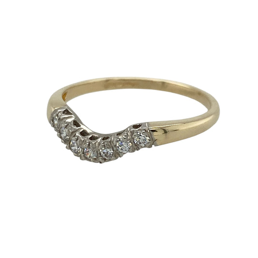 This pre-owned 9ct yellow gold diamond curved wishbone ring is an elegant and timeless design, perfect for wearing alone or stacked with other rings.

Design: The ring features a graceful curved wishbone shape, highlighted with sparkling diamonds across the front. Its delicate profile makes it ideal as a dress ring, wedding band companion, or stacking ring.
Material: Made from 9-carat yellow gold.
Gemstone Detail: Set with sparkling diamonds across the curved wishbone design.