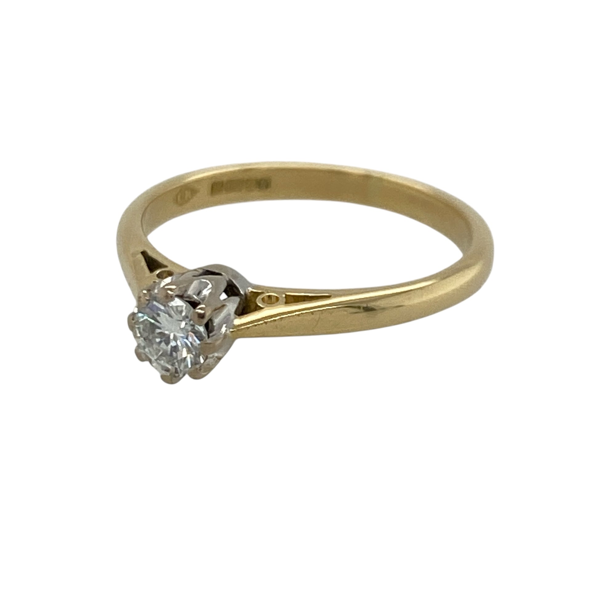 This pre-owned 18ct yellow gold diamond solitaire ring is a timeless classic, showcasing a beautiful brilliant cut diamond in an elegant setting.

Design: The ring features a single brilliant cut diamond that takes centre stage, creating a sophisticated and enduring design. Its simple yet elegant style makes it a perfect choice for an engagement ring, anniversary gift, or everyday luxury.
Material: Made from 18-carat yellow gold.
Gemstone Detail: One brilliant cut diamond weighing approximately 0.25ct.