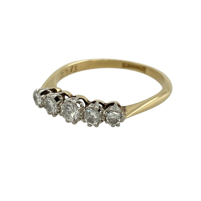 This pre-owned 18ct yellow gold and platinum diamond five stone band ring is a timeless classic, showcasing five sparkling diamonds in an elegant traditional setting.

Design: The ring features five graduated diamonds set across a platinum-topped band, creating a beautiful display of brilliance. The combination of rich 18-carat yellow gold and platinum gives this classic design a refined and enduring appeal, making it ideal as an anniversary ring, wedding band or everyday piece.