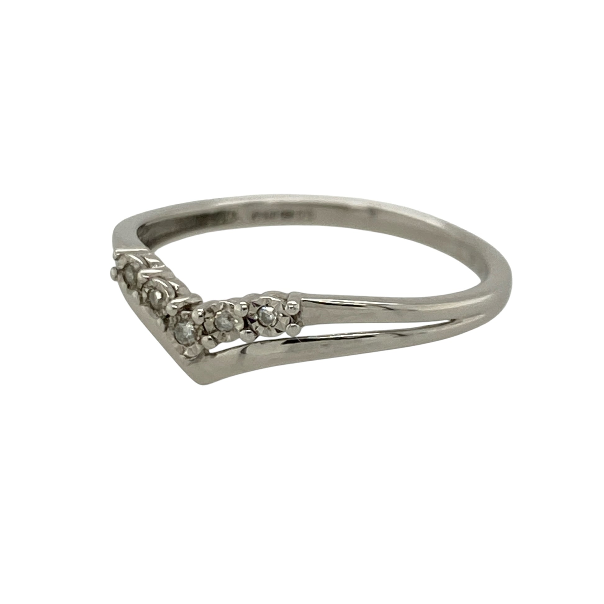 This pre-owned 9ct white gold diamond wishbone ring is a graceful and timeless design, perfect for wearing alone or stacked with an engagement ring or wedding band.

Design: The ring features a classic wishbone shape, accented with sparkling diamonds along the front for an elegant finish. Its curved profile makes it ideal for stacking while also looking beautiful as a standalone piece.
Material: Made from 9-carat white gold.
Gemstone Detail: Set with sparkling diamonds along the wishbone design.