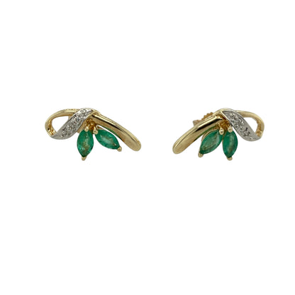 These pre-owned 9ct yellow gold diamond and emerald swirl stud earrings combine elegant curves with vibrant colour, creating a timeless and eye-catching design.

Design: Each stud features a graceful swirl design, set with a marquise cut emerald and accented by sparkling diamonds. The warm yellow gold beautifully complements the rich green emeralds, making these earrings perfect for both everyday wear and special occasions.
Material: Made from 9-carat yellow gold.