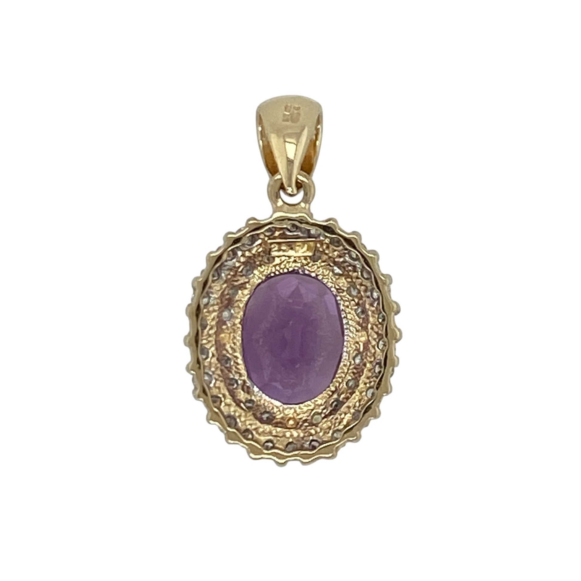 This pre-owned 9ct yellow gold diamond and amethyst cluster pendant showcases a vibrant oval amethyst surrounded by two sparkling rows of diamonds for an elegant and eye-catching design.

Design: The pendant features a stunning oval amethyst at its centre, framed by two rows of sparkling diamonds that enhance its rich purple colour. Finished with a polished yellow gold setting and a generous bail, it is perfect for pairing with a variety of chains.
Material: Made from 9-carat yellow gold.