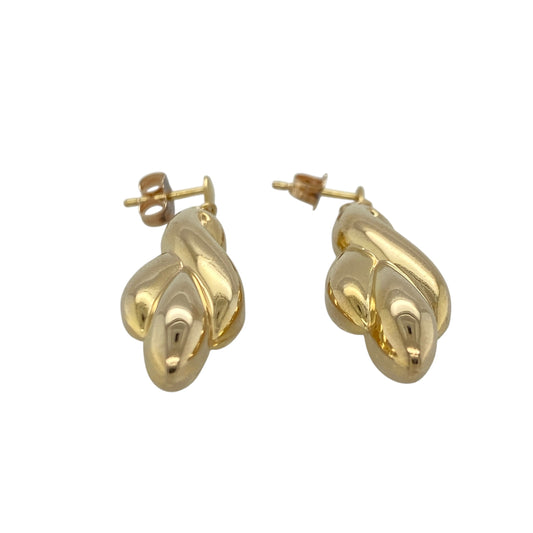 This pair of pre-owned 9ct yellow gold fancy chunky twist drop earrings features an eye-catching twisted design with a bold yet elegant look.

Design: These drop earrings showcase a chunky twisted design that creates beautiful texture and movement. Their polished yellow gold finish and flowing shape make them a stylish choice for both everyday wear and special occasions.
Material: Made from 9-carat yellow gold.
Earring Detail: Fancy chunky twist drop earrings with secure post and butterfly fittings.