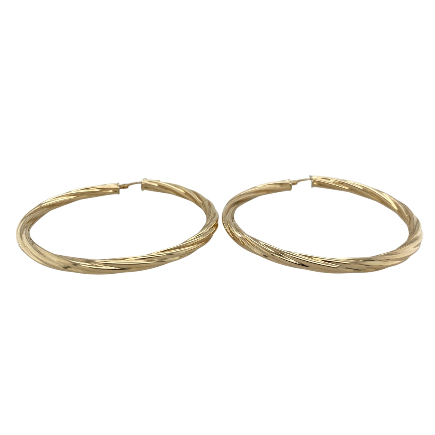 This pair of pre-owned 9ct yellow gold large twisted hoop creole earrings combines a bold size with a timeless twisted design.

Design: Featuring an elegant twisted finish, these large hoop creole earrings catch the light beautifully while adding texture and character. With an impressive 55mm diameter, they make a stylish statement while remaining versatile enough for both everyday wear and special occasions.
Material: Made from 9-carat yellow gold.