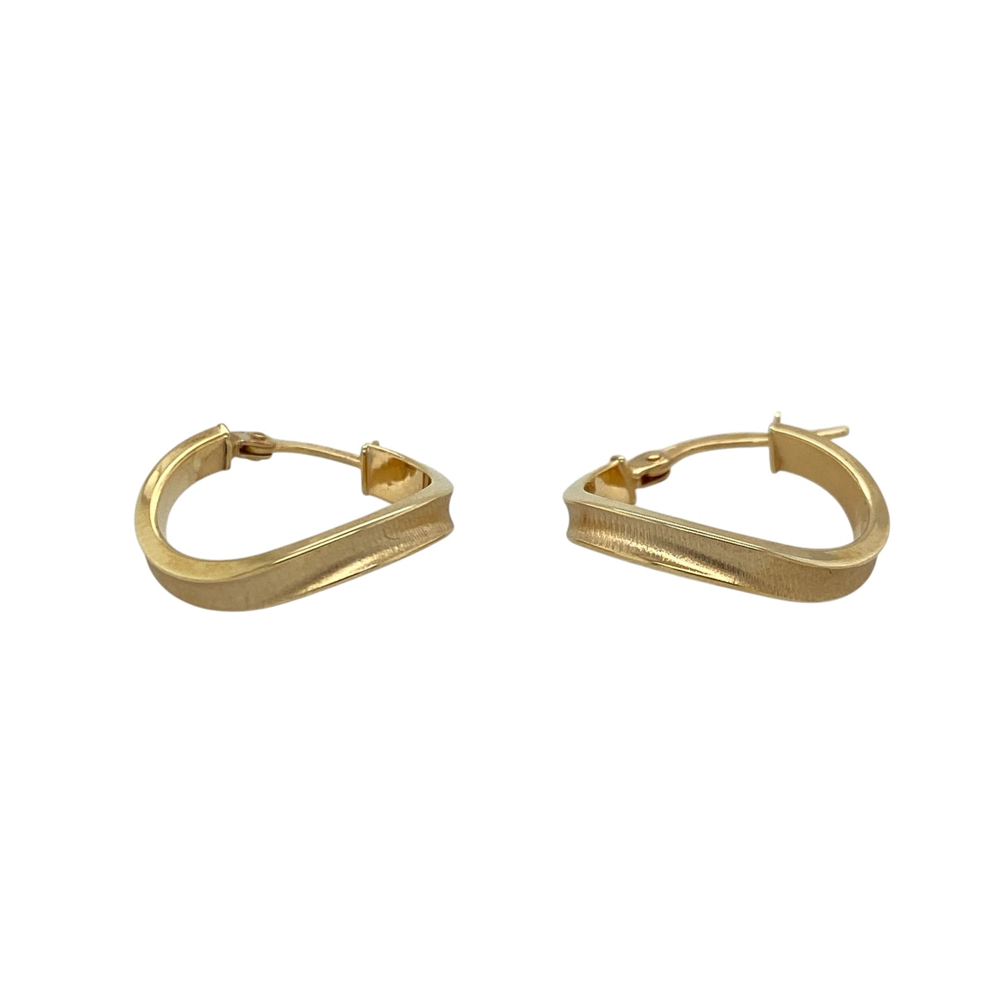 This pair of pre-owned 9ct yellow gold wave hoop creole earrings features a graceful flowing design with timeless appeal.

Design: These elegant hoop creole earrings showcase a distinctive wave profile, adding a subtle contemporary twist to the classic hoop style. Their lightweight design makes them comfortable for everyday wear while remaining versatile enough for any occasion.
Material: Made from 9-carat yellow gold.
Earring Detail: Wave hoop creole earrings with secure hinged fastenings.