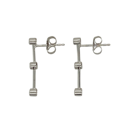 This pair of pre-owned 9ct white gold cubic zirconia drop earrings offers classic elegance with a touch of everyday sparkle.

Design: Featuring sparkling cubic zirconia stones in a graceful drop design, these earrings have a timeless style that is perfect for both everyday wear and special occasions. The white gold setting enhances the brilliance of the stones for an elegant finish.
Material: Made from 9-carat white gold.
Gemstone Detail: Set with sparkling cubic zirconia stones.