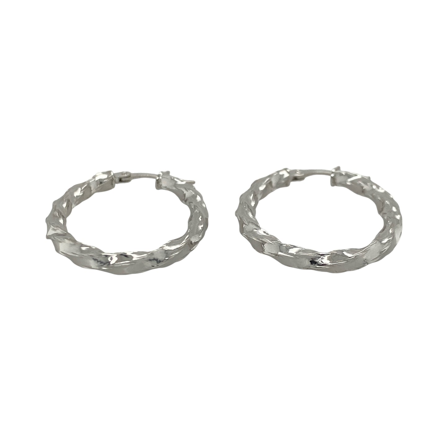 This pair of pre-owned 9ct white gold twisted oval creole earrings offers a stylish twist on a timeless jewellery classic.

Design: Featuring an elegant oval hoop shape with a twisted finish, these creole earrings catch the light beautifully while adding subtle texture and interest. Their versatile design makes them ideal for everyday wear as well as special occasions.
Material: Made from 9-carat white gold.
Earring Detail: Twisted oval creole earrings with secure hinged fastenings.
