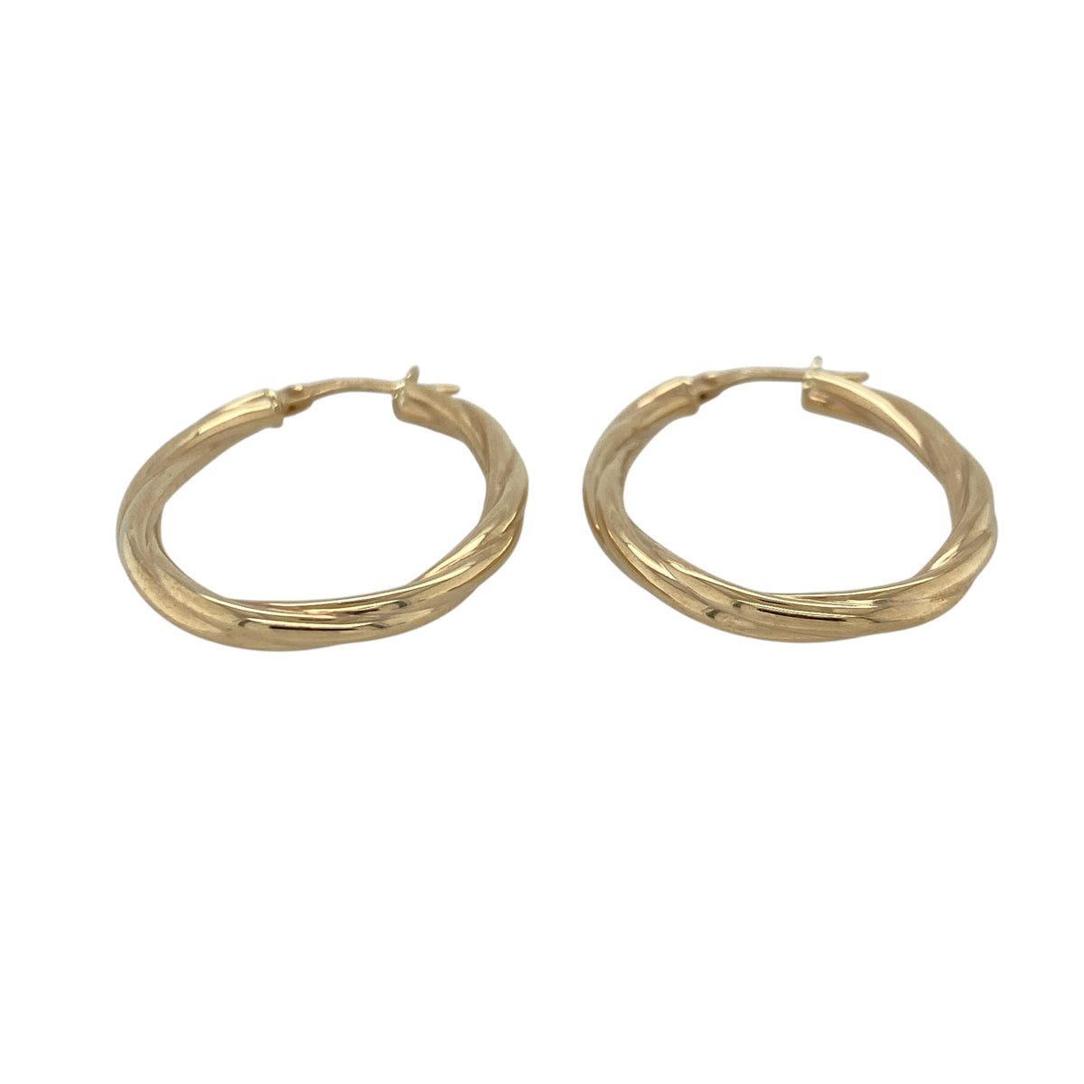 This pair of pre-owned 9ct yellow gold twisted oval creole earrings offers a timeless design with an elegant textured finish.

Design: Featuring an attractive twisted oval hoop design, these creole earrings catch the light beautifully while adding subtle texture and dimension. Their classic style makes them a versatile choice for everyday wear or special occasions.
Material: Made from 9-carat yellow gold.
Earring Detail: Twisted oval creole earrings with secure hinged fastenings.