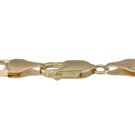 This pre-owned 9ct yellow gold curb bracelet is a bold statement piece with a timeless design.

Design: Featuring classic polished curb links, this substantial bracelet offers a timeless look that can be worn on its own or paired with other favourite jewellery. Its generous 8.5-inch length and 8mm wide links create an eye-catching piece suitable for everyday wear or special occasions.
Material: Made from 9-carat yellow gold.