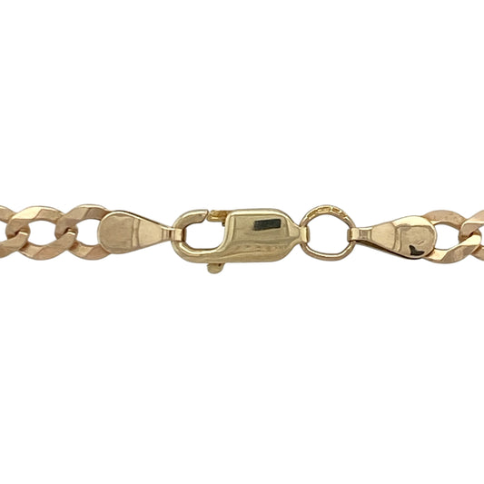 This pre-owned 9ct yellow gold curb chain is a timeless and versatile necklace with a classic everyday design.

Design: Featuring polished 4mm curb links, this 20-inch chain has a substantial feel while remaining comfortable to wear. Its classic style makes it ideal for wearing on its own or paired with a favourite pendant.
Material: Made from 9-carat yellow gold.
Necklace Detail: Curb chain measuring approximately 20 inches in length with links approximately 4mm wide and a secure clasp fastening.
