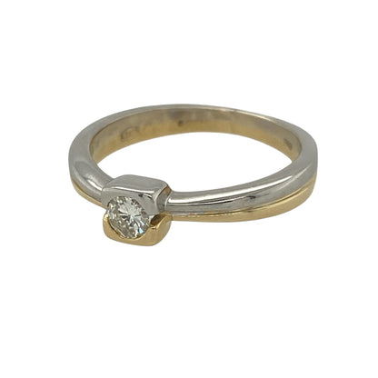 This pre-owned 18ct yellow and white gold diamond solitaire ring is a timeless design, featuring a brilliant cut diamond in a distinctive square setting.

Design: Showcasing an approximate 0.13ct brilliant cut diamond, this elegant solitaire ring features a contemporary square setting in contrasting white gold, enhancing the sparkle of the centre stone. The warm yellow gold band complements the modern setting, creating a classic ring that is perfect as an engagement ring or an everyday favourite.