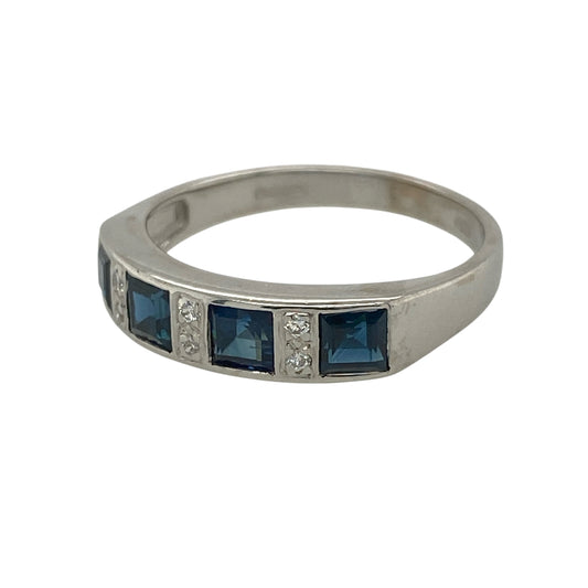 This pre-owned 18ct white gold diamond and sapphire band ring is a timeless piece, combining rich blue sapphires with elegant diamond sparkle.

Design: Featuring four square cut sapphires arranged across the front of the band, with sparkling diamonds set in between, this elegant ring creates a beautiful contrast of deep blue colour and brilliant sparkle. The front of the band measures approximately 4mm wide, making it ideal for everyday wear or as a meaningful anniversary or dress ring.
