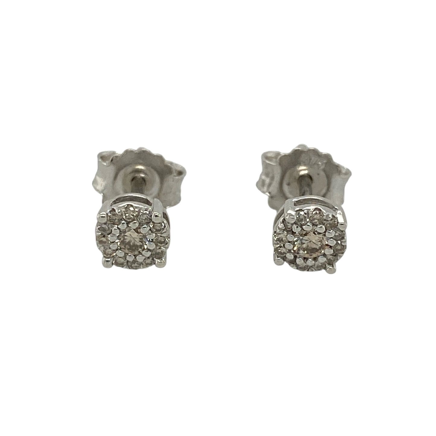 This pre-owned 9ct white gold diamond cluster stud earrings offer timeless elegance with a classic sparkling design.

Design: Featuring a beautiful cluster of sparkling diamonds, these elegant stud earrings create the appearance of a larger centrepiece while maintaining a refined and versatile style. Their polished white gold setting enhances the brilliance of the diamonds, making them perfect for everyday wear or special occasions.
Material: Made from 9-carat white gold.