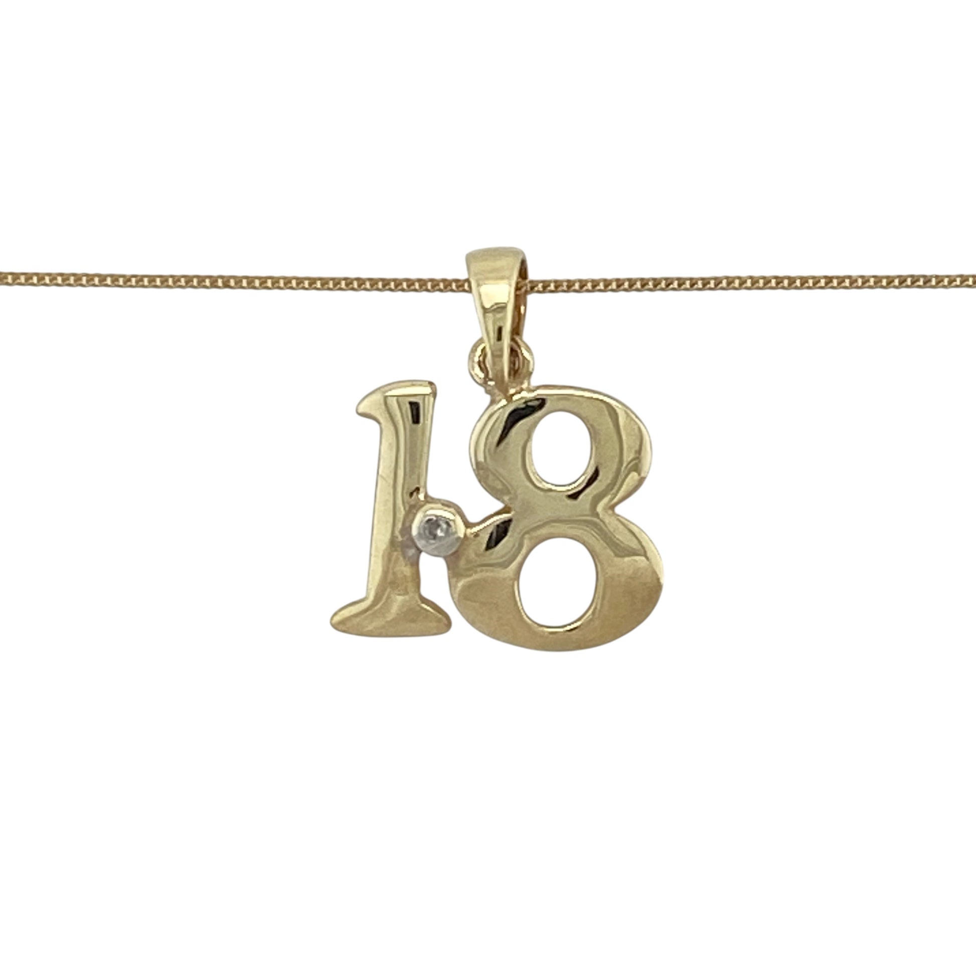 This pre-owned 9ct yellow gold diamond set '18' pendant necklace is a meaningful keepsake, perfect for celebrating a special milestone birthday.

Design: Featuring a sparkling diamond set '18' pendant suspended from a fine 18-inch curb chain, this elegant necklace is a timeless way to mark an eighteenth birthday or commemorate a special occasion. The pendant measures approximately 1.6cm long including the bail, offering a delicate yet eye-catching finish.
