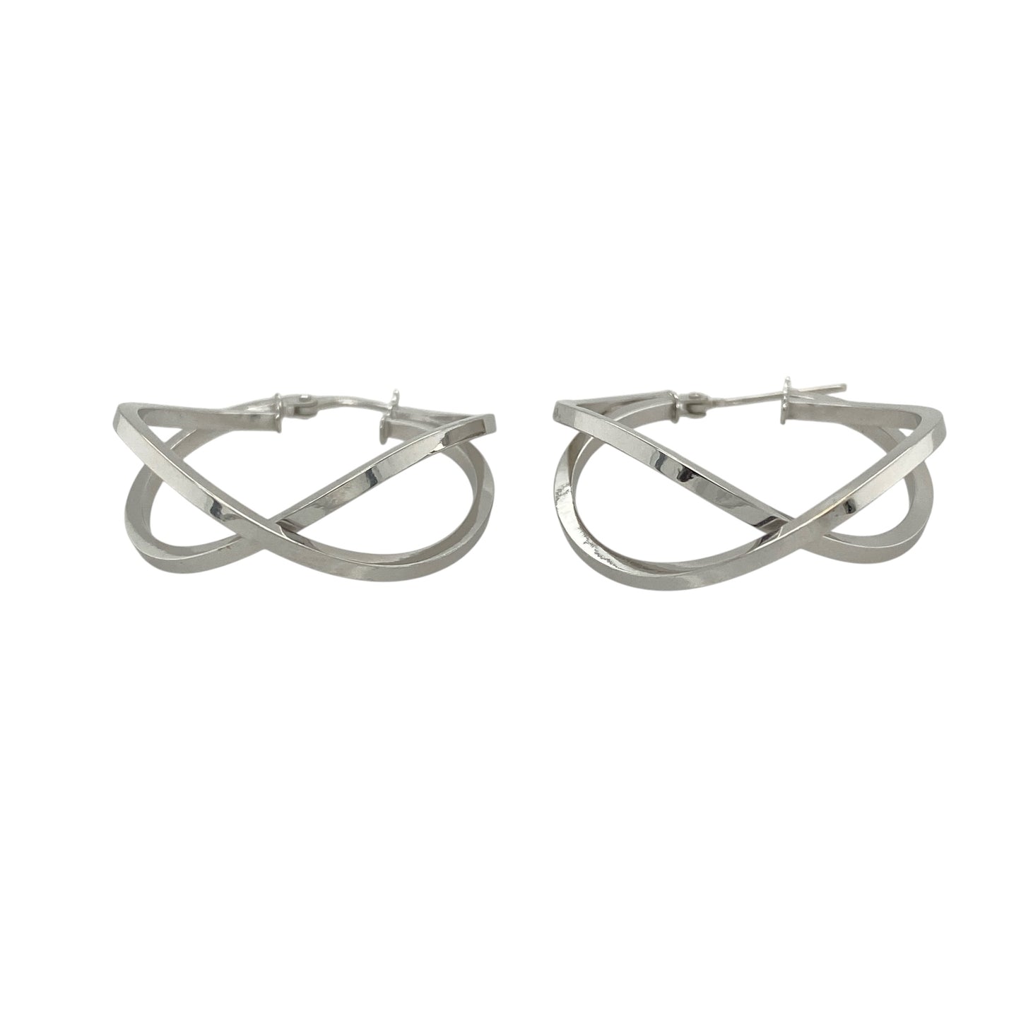 This pair of pre-owned 9ct white gold crossover hoop creole earrings offers a contemporary twist on a timeless jewellery classic.

Design: Featuring an elegant crossover design, these polished hoop creole earrings create a stylish layered effect while maintaining a lightweight and comfortable feel. Measuring approximately 30mm in diameter, they are the perfect size for everyday wear or adding a sophisticated finishing touch to any outfit.
Material: Made from 9-carat white gold.