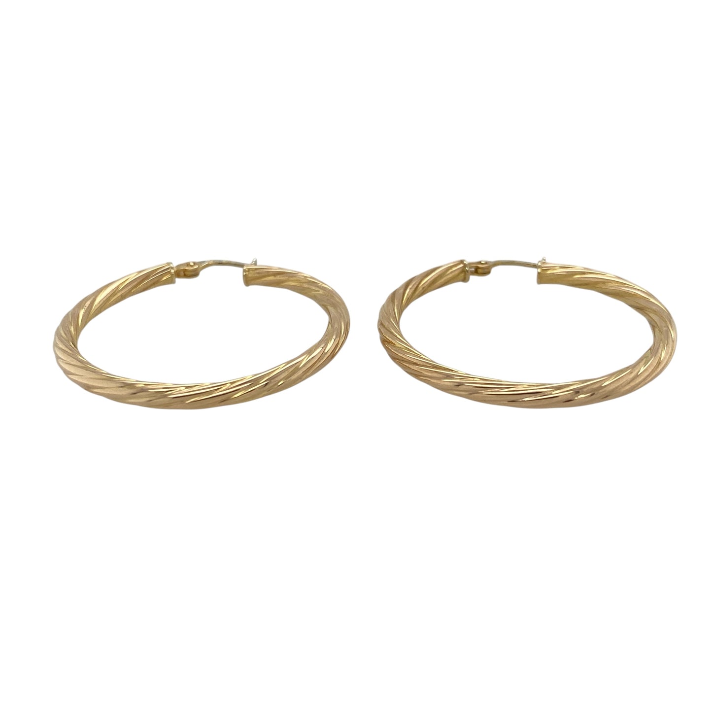 This pair of pre-owned 9ct yellow gold twisted hoop creole earrings combines timeless style with a classic twisted finish.

Design: Featuring an elegant twisted hoop design, these polished creole earrings catch the light beautifully, adding texture and sparkle to a timeless style. Measuring approximately 35mm in diameter, they offer a bold yet lightweight look, making them ideal for everyday wear or special occasions.
Material: Made from 9-carat yellow gold.
Size & Weight: Hoop diameter approximately 35mm.