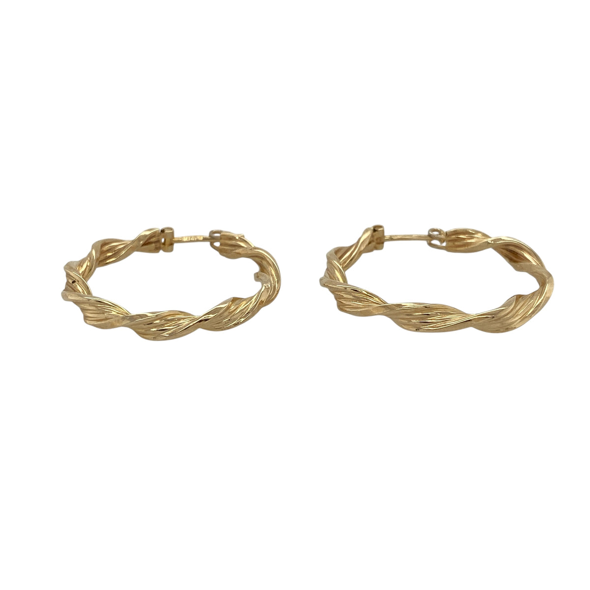 This pair of pre-owned 9ct yellow gold twisted hoop creole earrings offers timeless style with an elegant textured finish.

Design: Featuring a classic twisted hoop design, these polished creole earrings reflect the light beautifully, creating extra texture and sparkle. Measuring approximately 26mm in diameter, they are the perfect size for comfortable everyday wear while adding a touch of timeless elegance to any outfit.
Material: Made from 9-carat yellow gold.