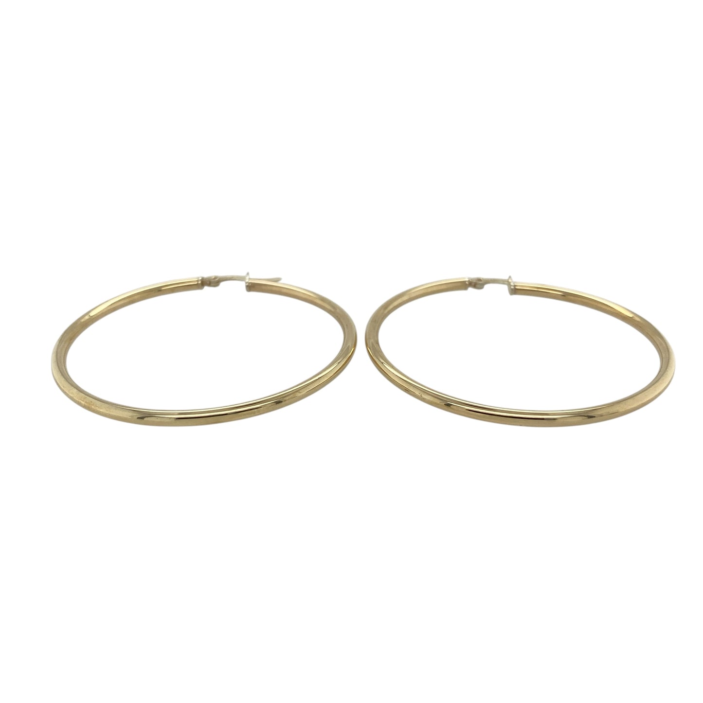 This pair of pre-owned 9ct yellow gold large plain hoop creole earrings is a timeless jewellery staple with a bold, eye-catching look.

Design: Featuring a classic plain polished hoop design, these large creole earrings offer effortless style that never goes out of fashion. Measuring approximately 49mm in diameter, they create a striking statement while remaining versatile enough to complement both everyday and occasion wear.
Material: Made from 9-carat yellow gold.