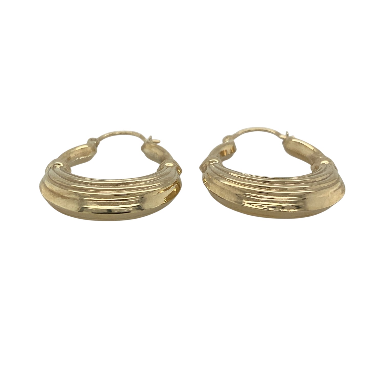 This pair of pre-owned 9ct yellow gold large textured oval creole earrings offers a bold yet timeless look, perfect for everyday elegance.

Design: Featuring a large oval creole shape with a beautifully textured finish, these earrings catch the light from every angle, adding extra depth and sparkle. Their classic yet eye-catching design makes them a versatile accessory that complements both casual and formal outfits.
Material: Made from 9-carat yellow gold.
Size & Weight: Total weight 3.50 grams.