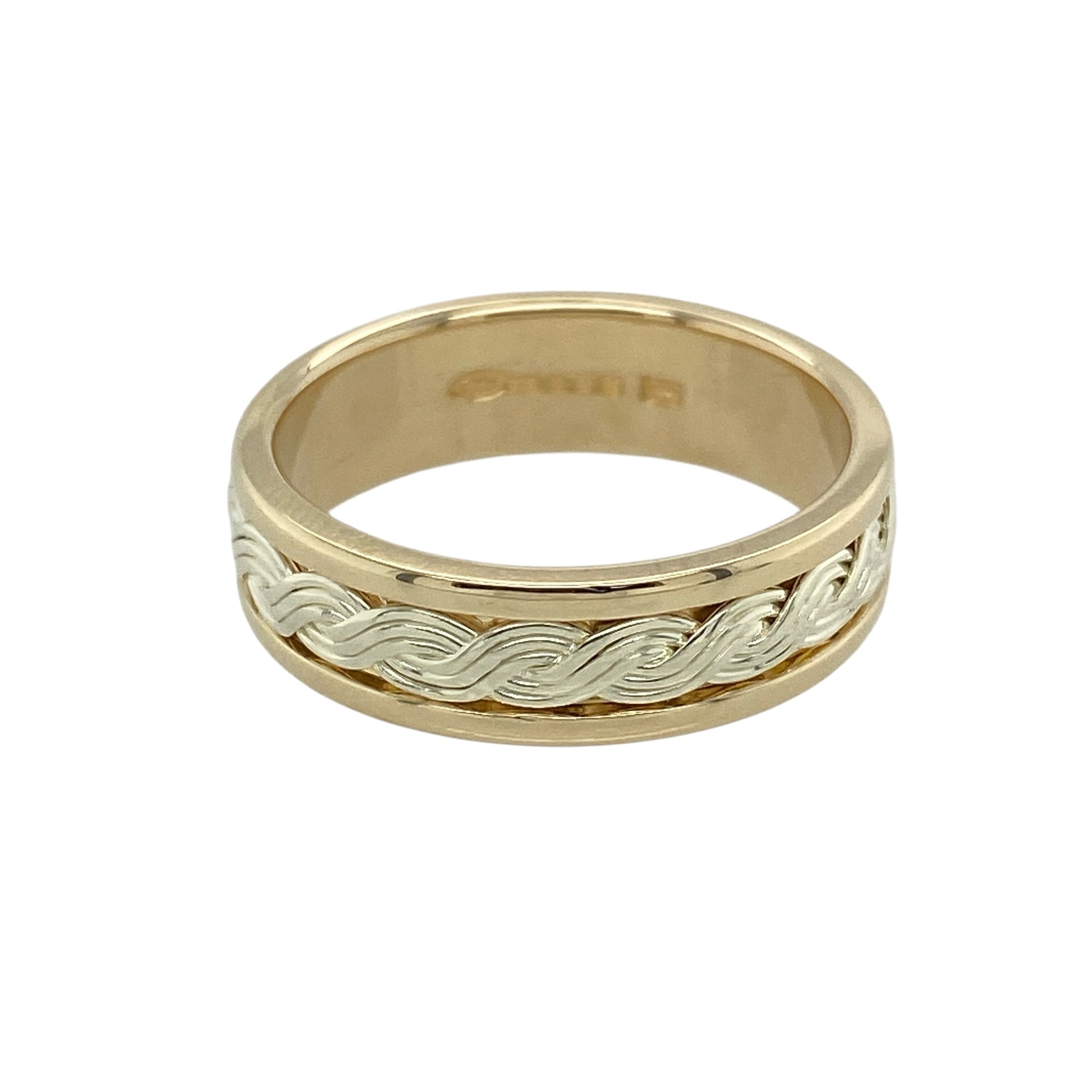 This pre-owned 9ct yellow and white Welsh Gold Cymru metal twisted band ring beautifully combines traditional Welsh heritage with a timeless contemporary design.

Design: Featuring an elegant twisted band crafted from contrasting yellow and white gold, this striking ring celebrates Welsh craftsmanship with its distinctive Cymru metal design. Measuring approximately 6mm wide, it offers a bold yet comfortable fit, making it perfect for everyday wear or as a meaningful wedding or dress ring.