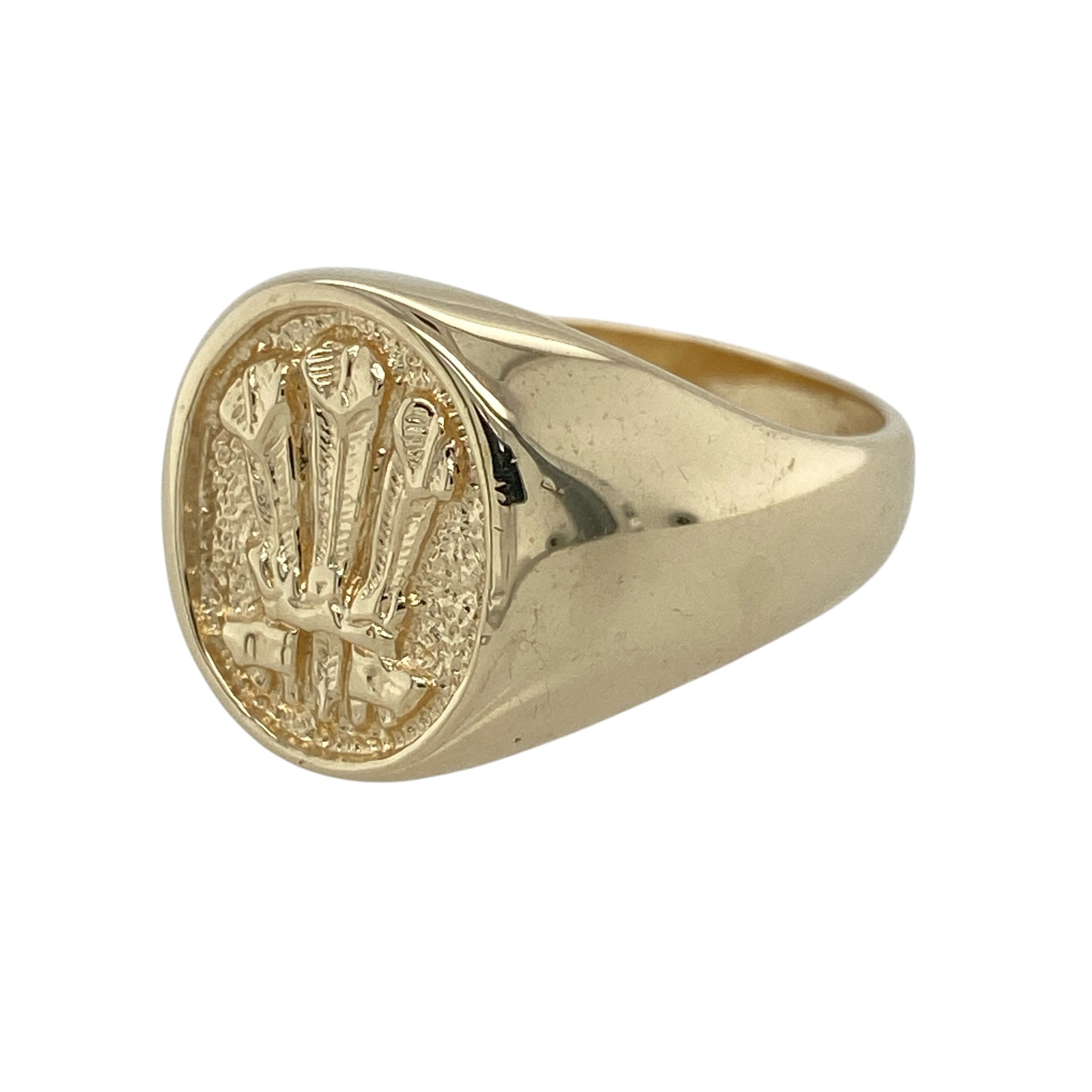 This pre-owned 9ct yellow gold Welsh Three Feathers oval signet ring is a bold and timeless piece, proudly showcasing one of Wales' most iconic emblems.

Design: Featuring the renowned Welsh Three Feathers motif on a polished oval signet face, this classic ring celebrates Welsh heritage in a striking design. Measuring approximately 14mm high across the front, it has a substantial profile that makes it an eye-catching piece while remaining comfortable for everyday wear.
