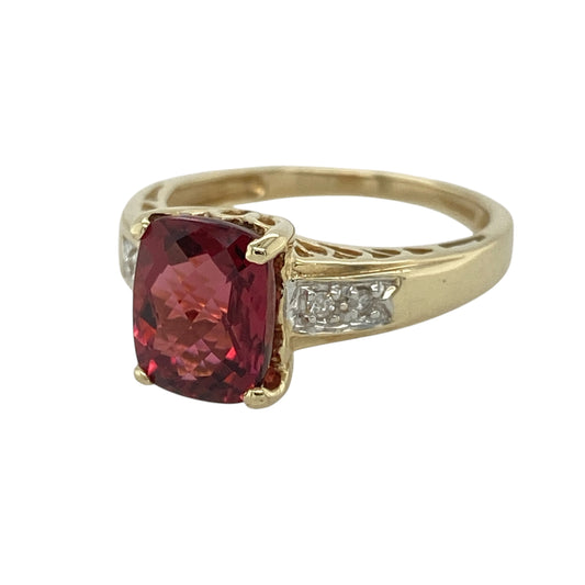 This pre-owned 9ct yellow gold diamond and red stone ring is a striking piece, combining a bold centre stone with classic diamond accents.

Design: Featuring a rectangular red stone at its centre, this elegant ring is enhanced by sparkling diamonds set along the shoulders, creating a timeless and sophisticated look. The rich colour of the centre stone contrasts beautifully with the warm yellow gold, making it an eye-catching choice for both everyday wear and special occasions.