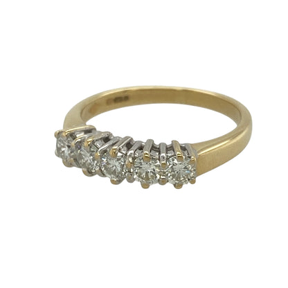This pre-owned 18ct yellow gold diamond five stone band ring is a timeless design, showcasing five brilliant cut diamonds with exceptional sparkle.

Design: Featuring five graduating brilliant cut diamonds set across the front, this elegant band offers a classic style that never goes out of fashion. With approximately 0.50ct of total diamond content, it is a beautiful choice as an anniversary ring, wedding band or sophisticated everyday piece.
Material: Made from 18-carat yellow gold.