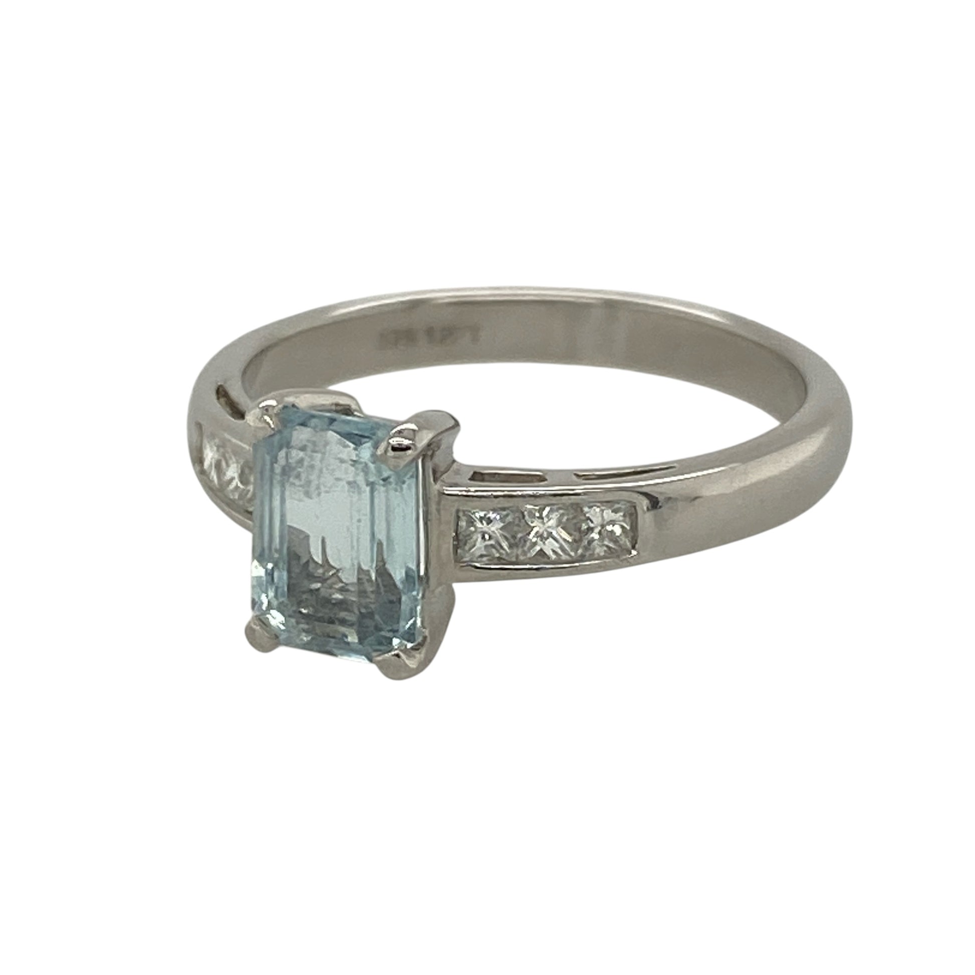 This pre-owned 9ct white gold diamond and aquamarine ring is an elegant design, beautifully combining the soft blue tones of aquamarine with sparkling diamond accents.

Design: Featuring a striking rectangular aquamarine at its centre, this timeless ring is enhanced by diamonds set along the shoulders, adding extra brilliance and sophistication. The cool white gold setting perfectly complements the fresh blue hue of the aquamarine, making it an ideal choice for both everyday wear and special occasions.
