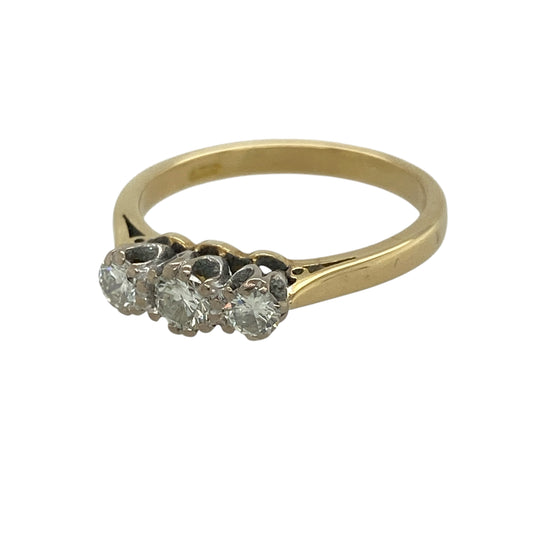 This pre-owned 18ct yellow gold diamond trilogy ring is a timeless and elegant design, symbolising the past, present and future with three sparkling diamonds.

Design: Featuring three beautifully matched diamonds in a classic trilogy setting, this elegant ring offers enduring style and exceptional brilliance. With approximately 0.35ct of total diamond content, it is a wonderful choice for an engagement ring, anniversary gift or a sophisticated everyday piece.
Material: Made from 18-carat yellow gold.