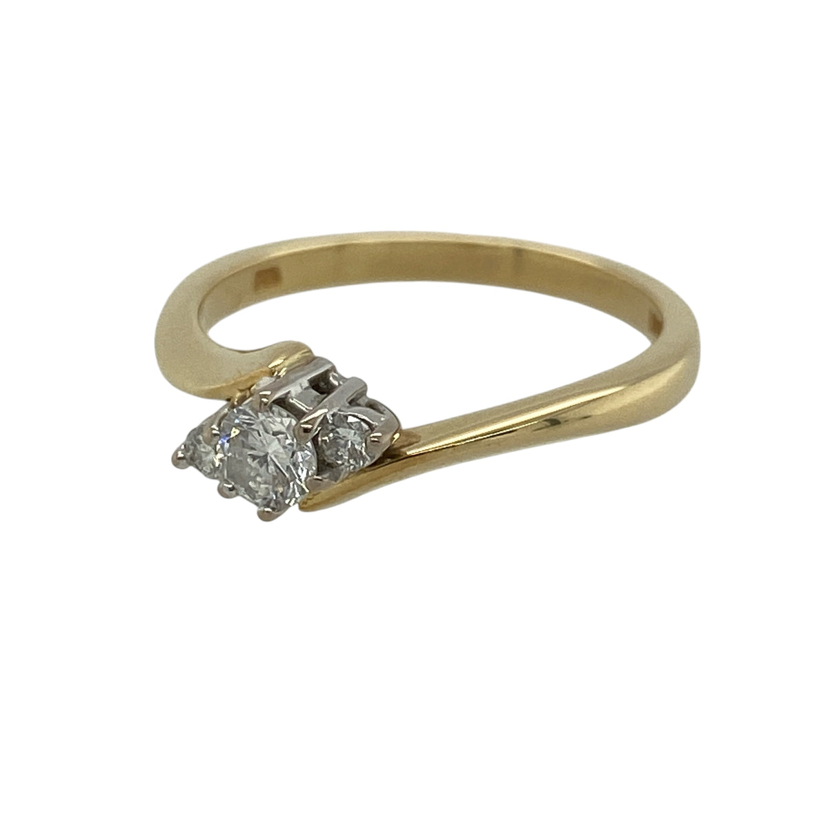 This pre-owned 18ct yellow gold diamond trilogy twist ring is a timeless and elegant design, combining graceful curves with sparkling diamonds.

Design: Featuring three diamonds in a beautiful twist setting, this elegant trilogy ring symbolises the past, present and future. The flowing twist design enhances the brilliance of the approximately 0.28ct total diamond content, creating a sophisticated ring that is perfect for an engagement, anniversary or everyday wear.
Material: Made from 18-carat yellow gold.