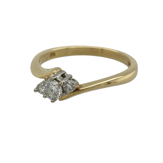 This pre-owned 18ct yellow gold diamond trilogy twist ring is a timeless and elegant design, combining graceful curves with sparkling diamonds.

Design: Featuring three diamonds in a beautiful twist setting, this elegant trilogy ring symbolises the past, present and future. The flowing twist design enhances the brilliance of the approximately 0.28ct total diamond content, creating a sophisticated ring that is perfect for an engagement, anniversary or everyday wear.
Material: Made from 18-carat yellow gold.