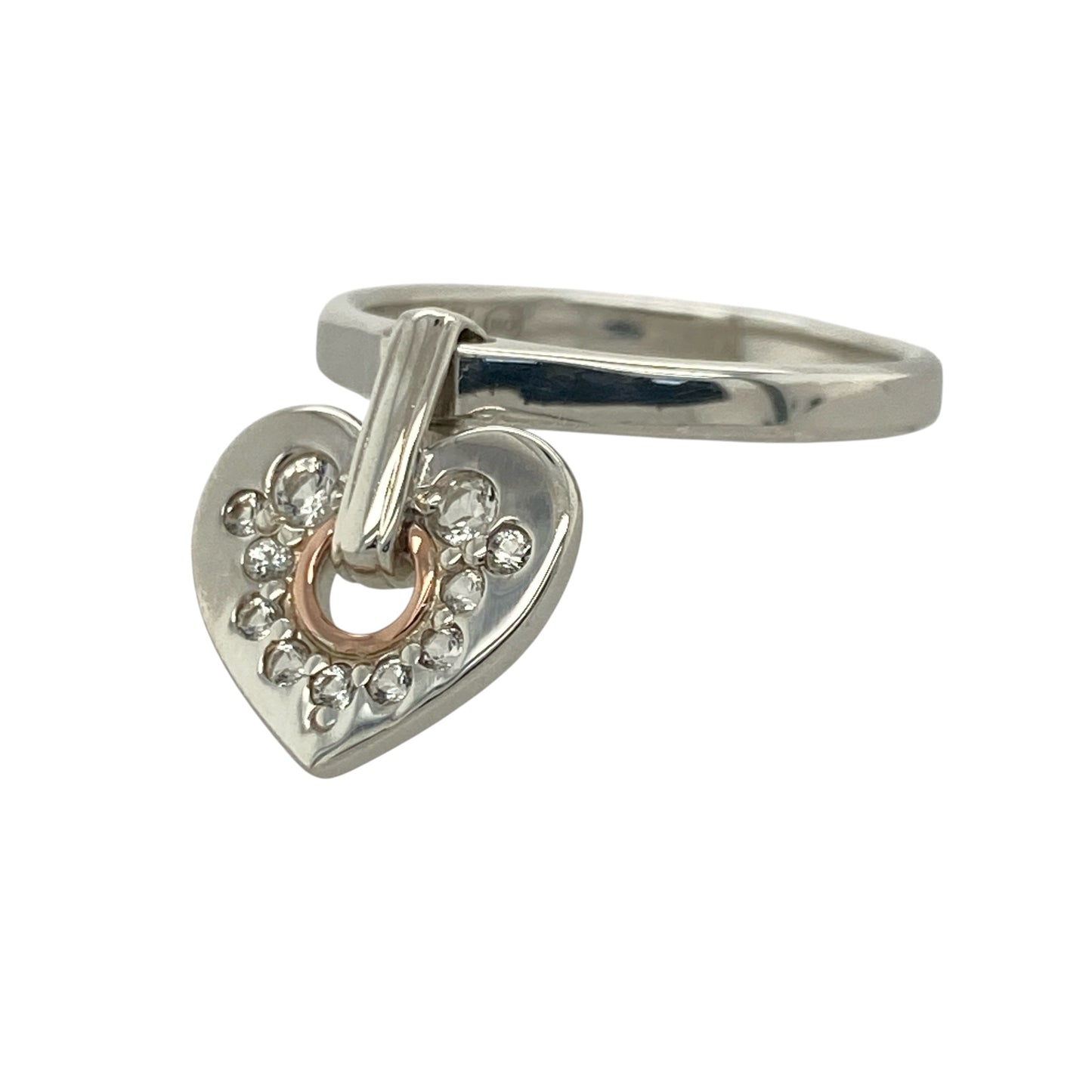 This pre-owned Clogau heart charm ring is a beautiful sterling silver and 9ct rose gold design, finished with sparkling white topaz and a distinctive heart detail.

Design: Featuring a charming heart design with signature 9ct rose gold detailing, this Clogau ring is enhanced by sparkling white topaz for an elegant finish. The front of the ring measures approximately 14mm high, creating an eye-catching design that beautifully combines sterling silver with warm rose gold.