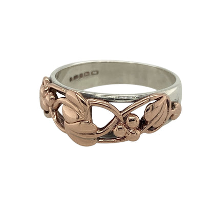 Bring meaningful elegance and heritage symbolism to your jewellery collection with this pre-owned 925 silver Clogau Tree of Life ring, featuring 9ct rose gold detailing—perfect for celebrating growth, connection, and timeless beauty.

Design: The ring features the iconic Tree of Life design across the front of the 8mm wide band, with flowing 9ct rose gold vines woven into the pattern for a graceful, layered effect.