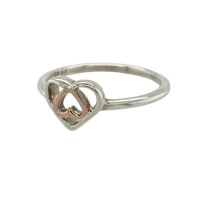 This pre-owned Clogau heart ring is a delicate sterling silver and 9ct rose gold design, combining a romantic heart motif with classic two-tone styling.

Design: Featuring a charming heart design with signature 9ct rose gold detailing, this Clogau ring beautifully combines polished sterling silver with warm rose gold. The front measures approximately 7mm high, giving the ring a delicate and versatile look that is perfect for everyday wear or as a meaningful gift.